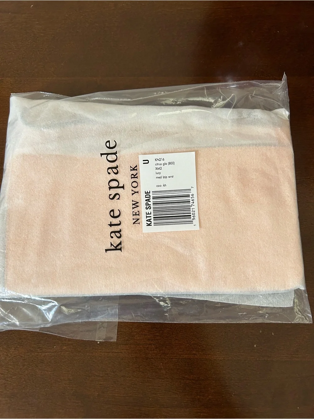 kate spade Lucy Medium L-Zip Wristlet in Citrus Glaze MSRP $139